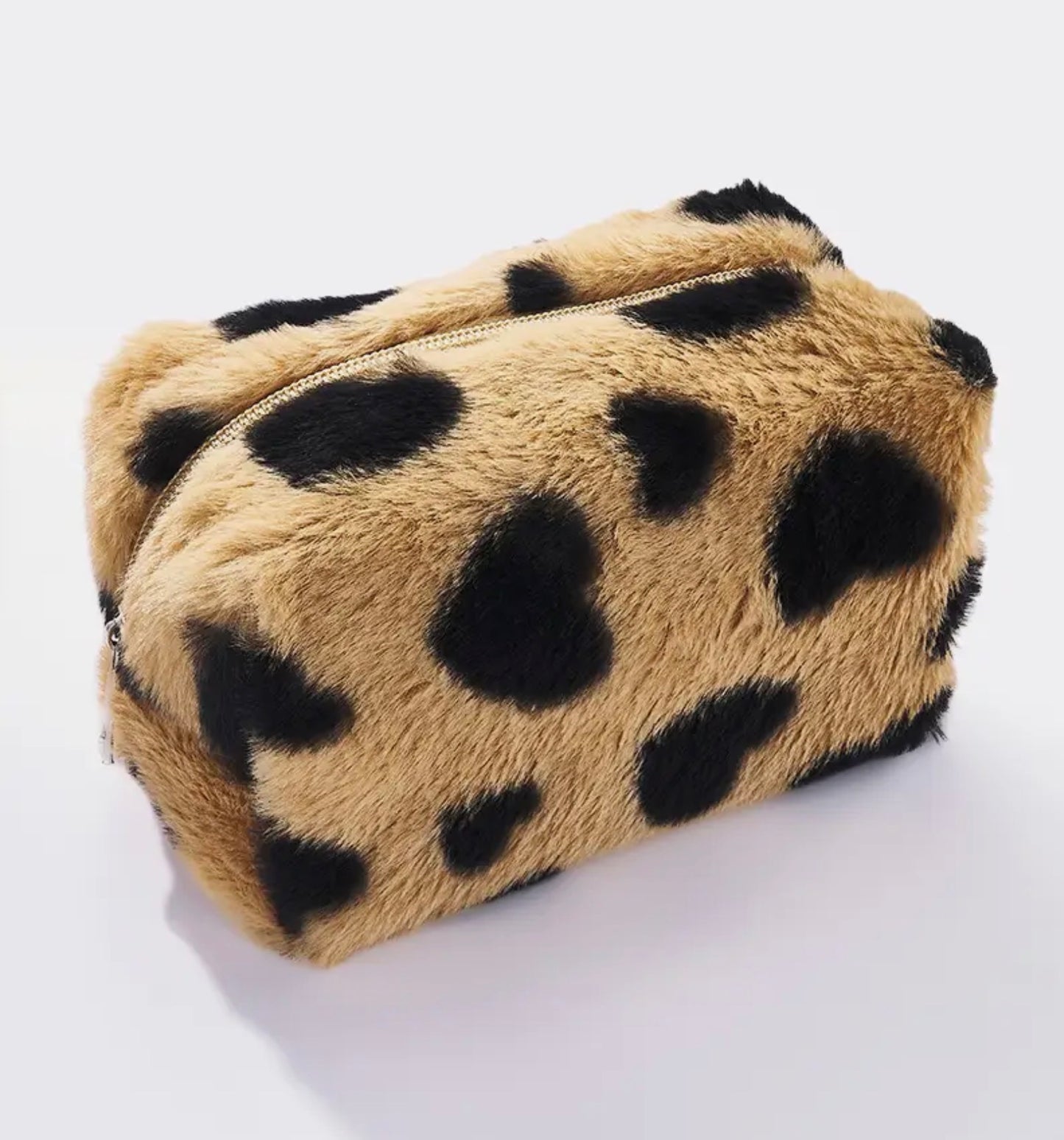 Trousse fausse fourrure motif cœurs